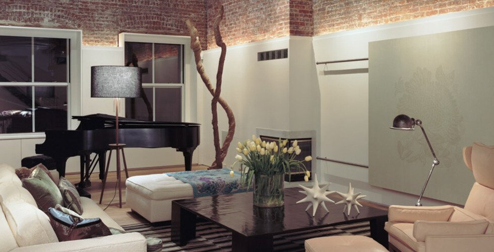 Living room in the Soho Loft project by CLW Design in New York, NY