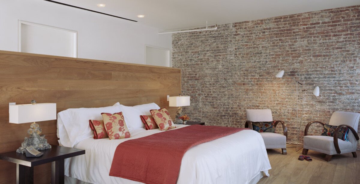 Bedroom in the Soho Loft project by CLW Design in New York, NY